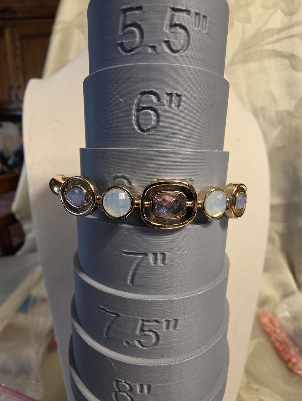 #1446. Gold-Tone Multi Stone Bracelet with Purple Center